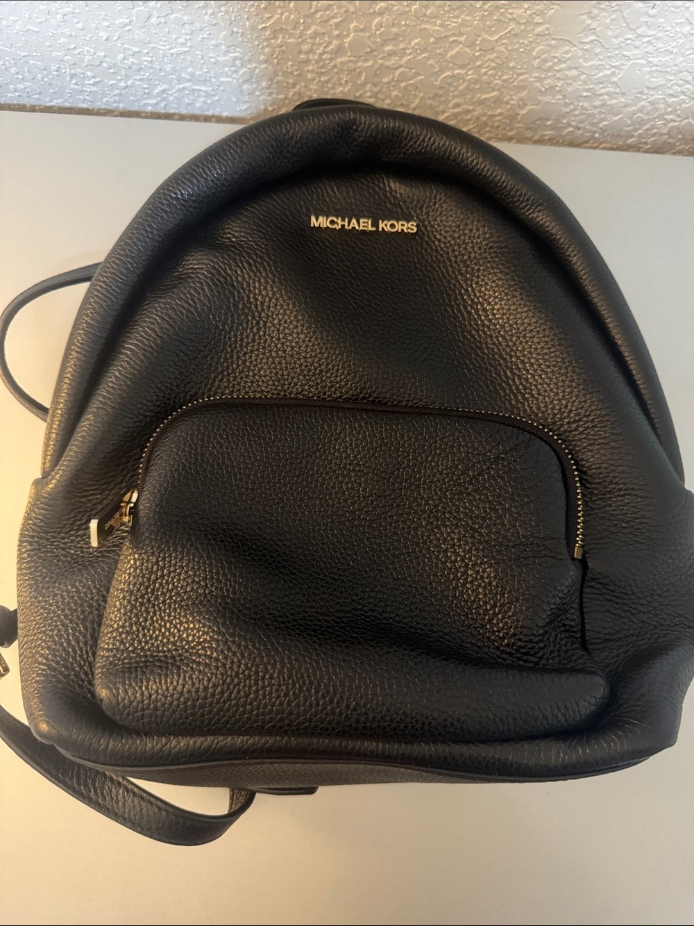 MICHAEL KORS Black Pebbled Leather Men’s Backpack with Gold Logo